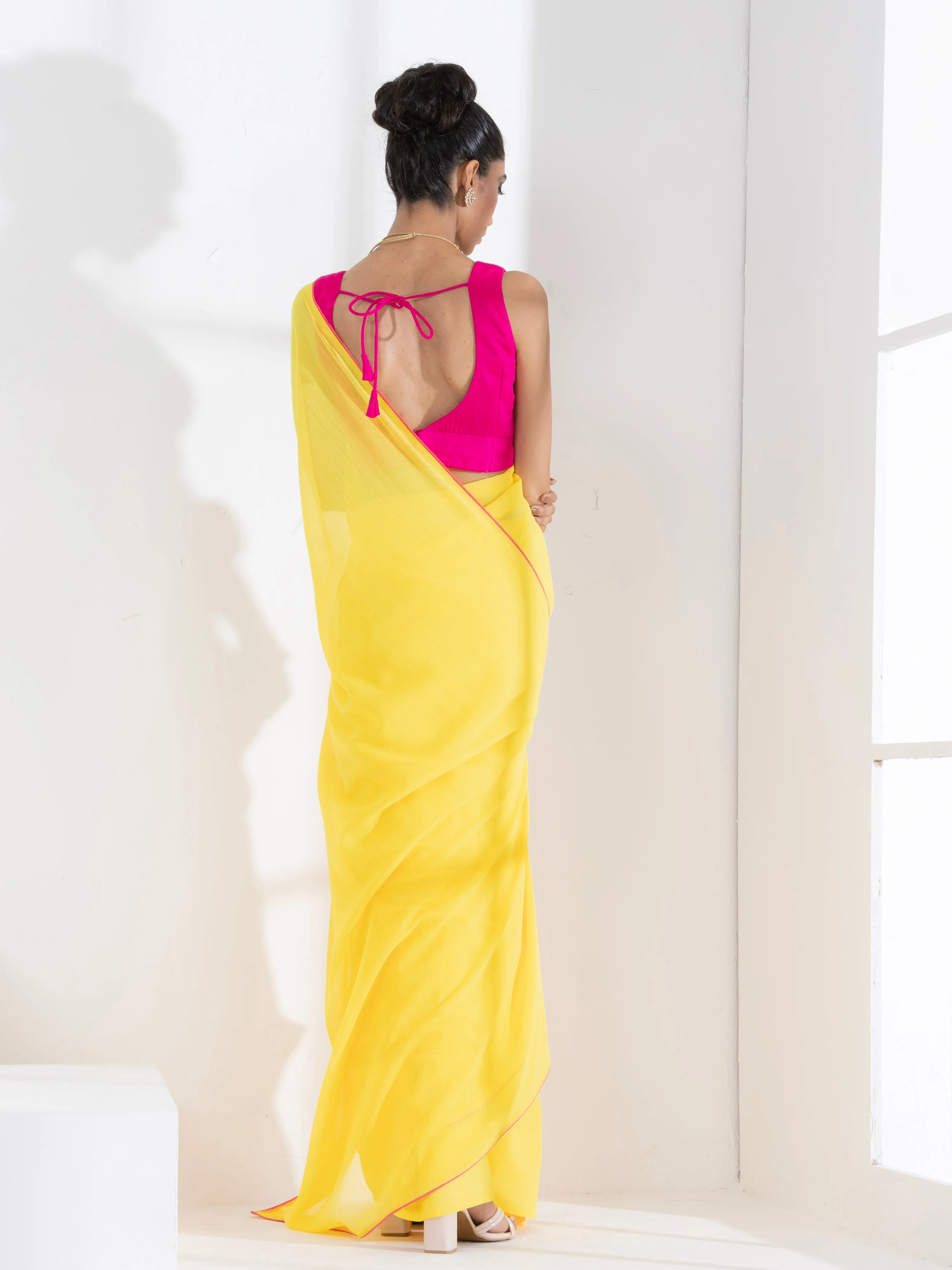 Corn Yellow Textured Chiffon Saree with Pink Piping and Fuchsia Blouse Fabric