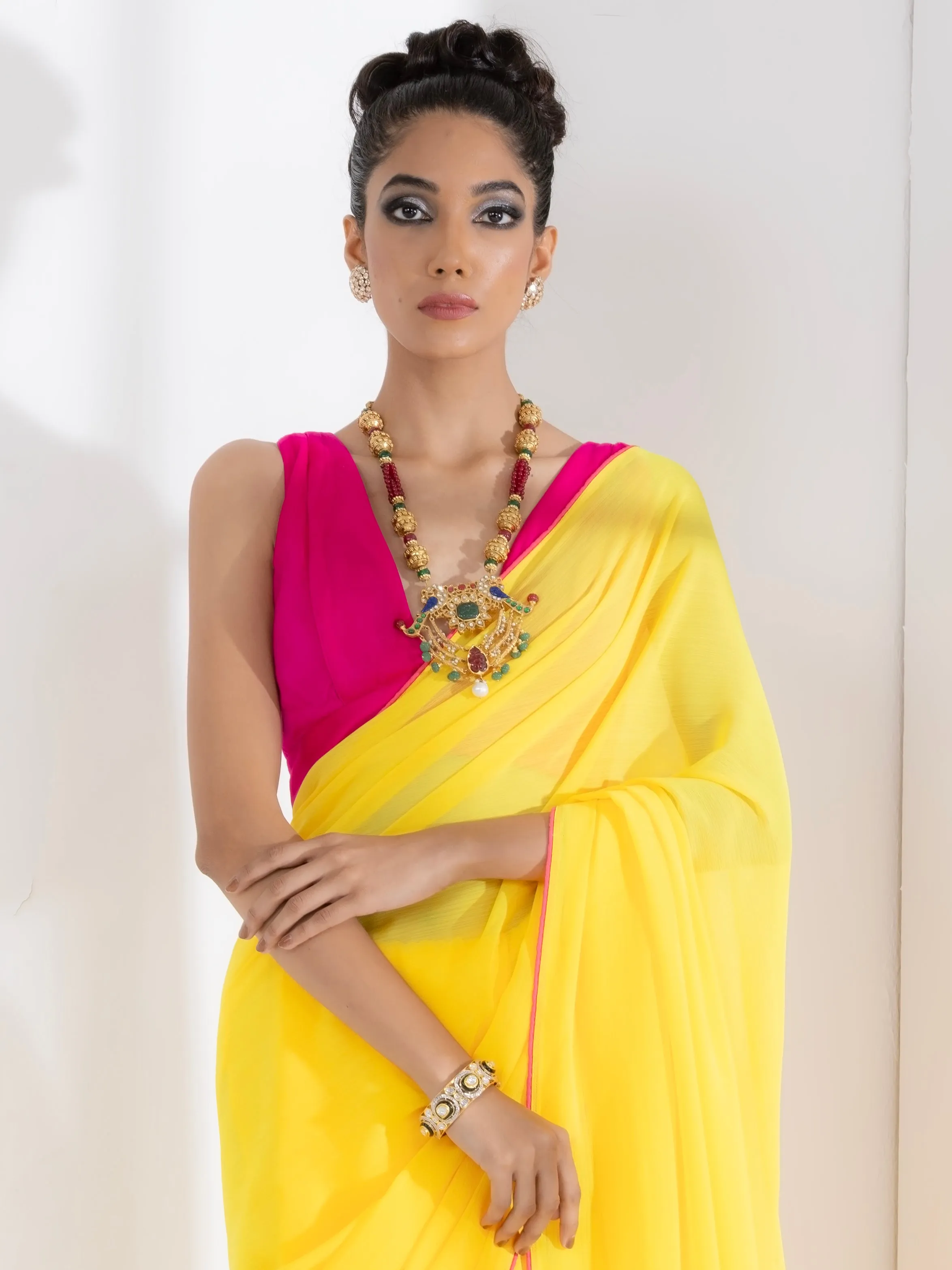 Corn Yellow Textured Chiffon Saree with Pink Piping and Fuchsia Blouse Fabric