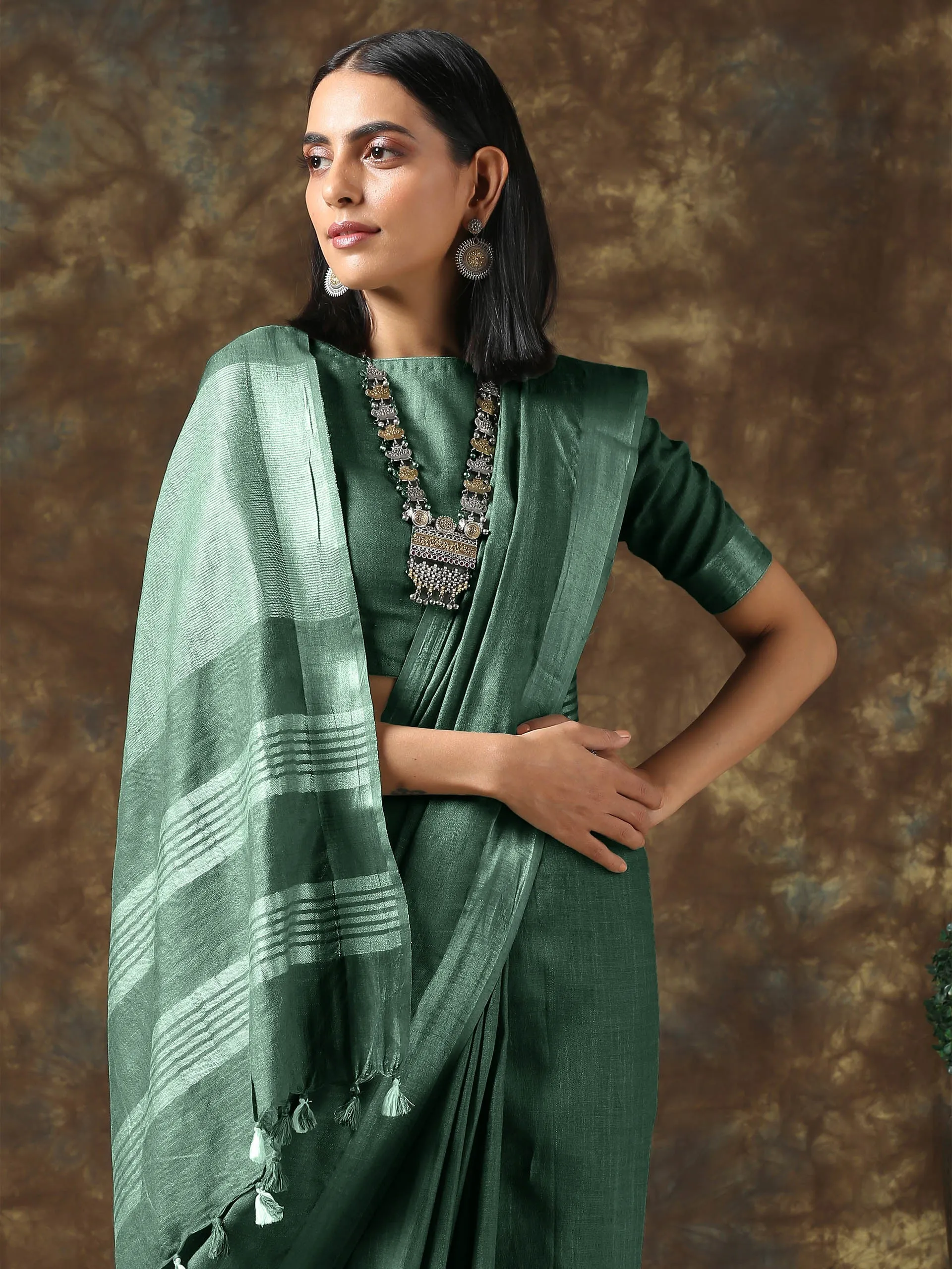 Opulent Olive Linen Blend Saree with Silver Border and Blouse