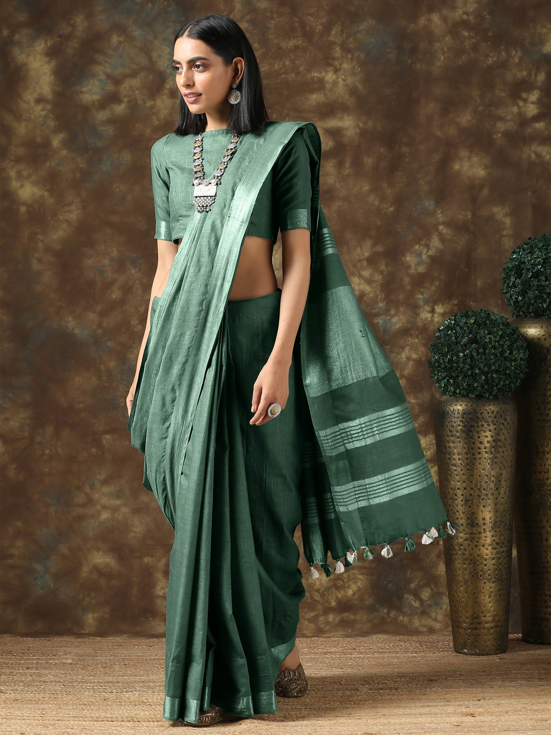 Opulent Olive Linen Blend Saree with Silver Border and Blouse
