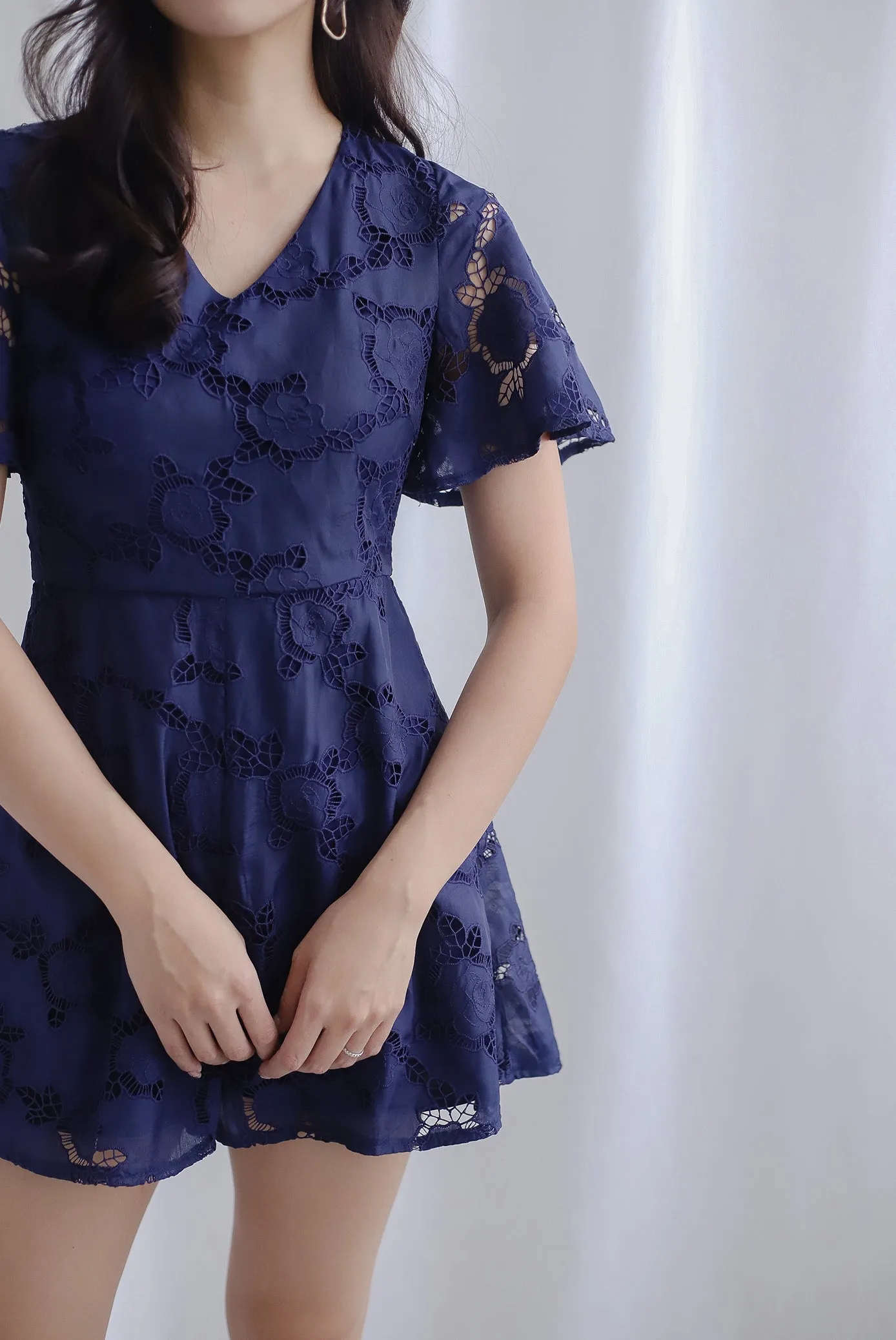 Starli Eyelet Embroidery Sleeved Romper In Navy Blue